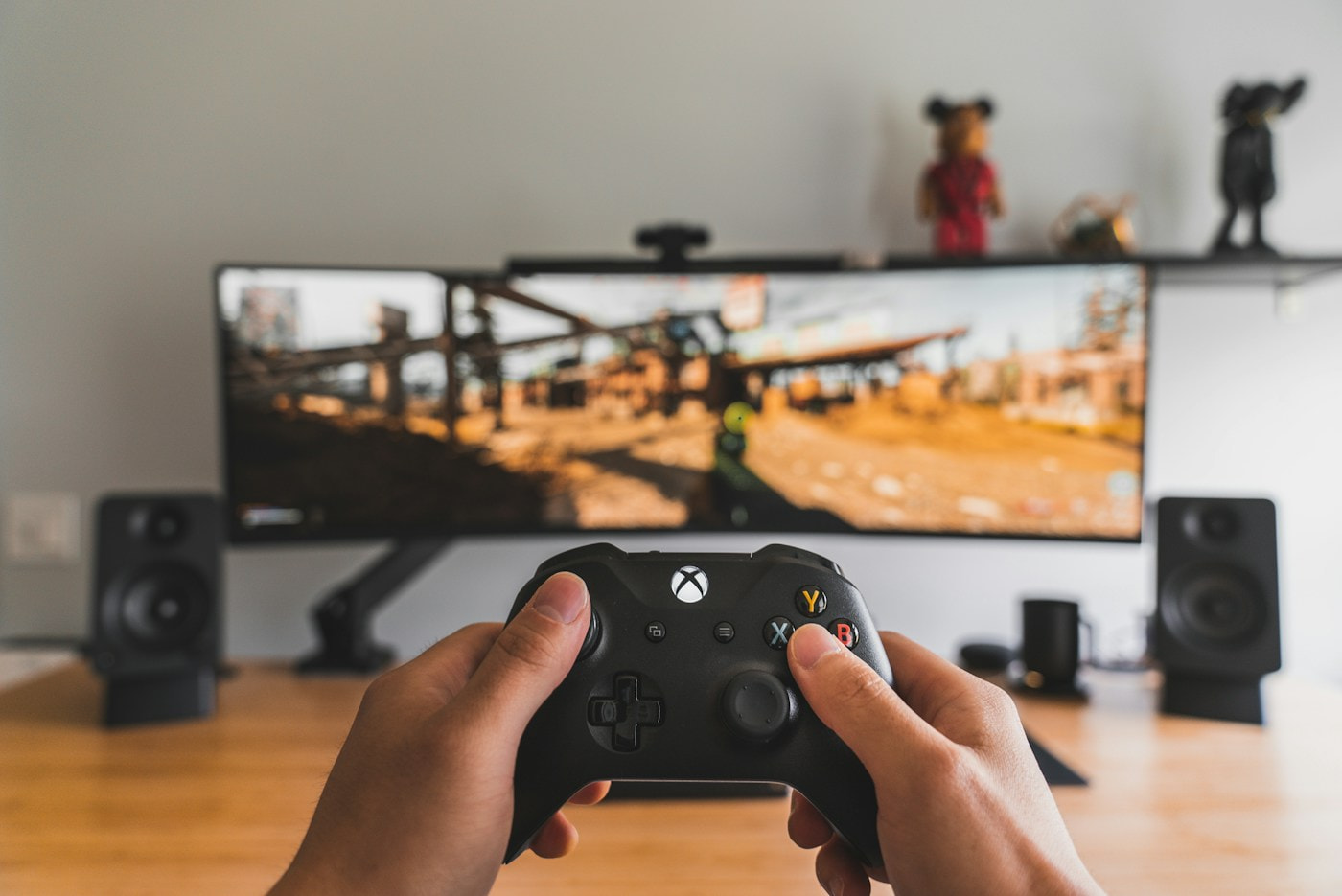 Game controller and computer setup, illustrative industry photo